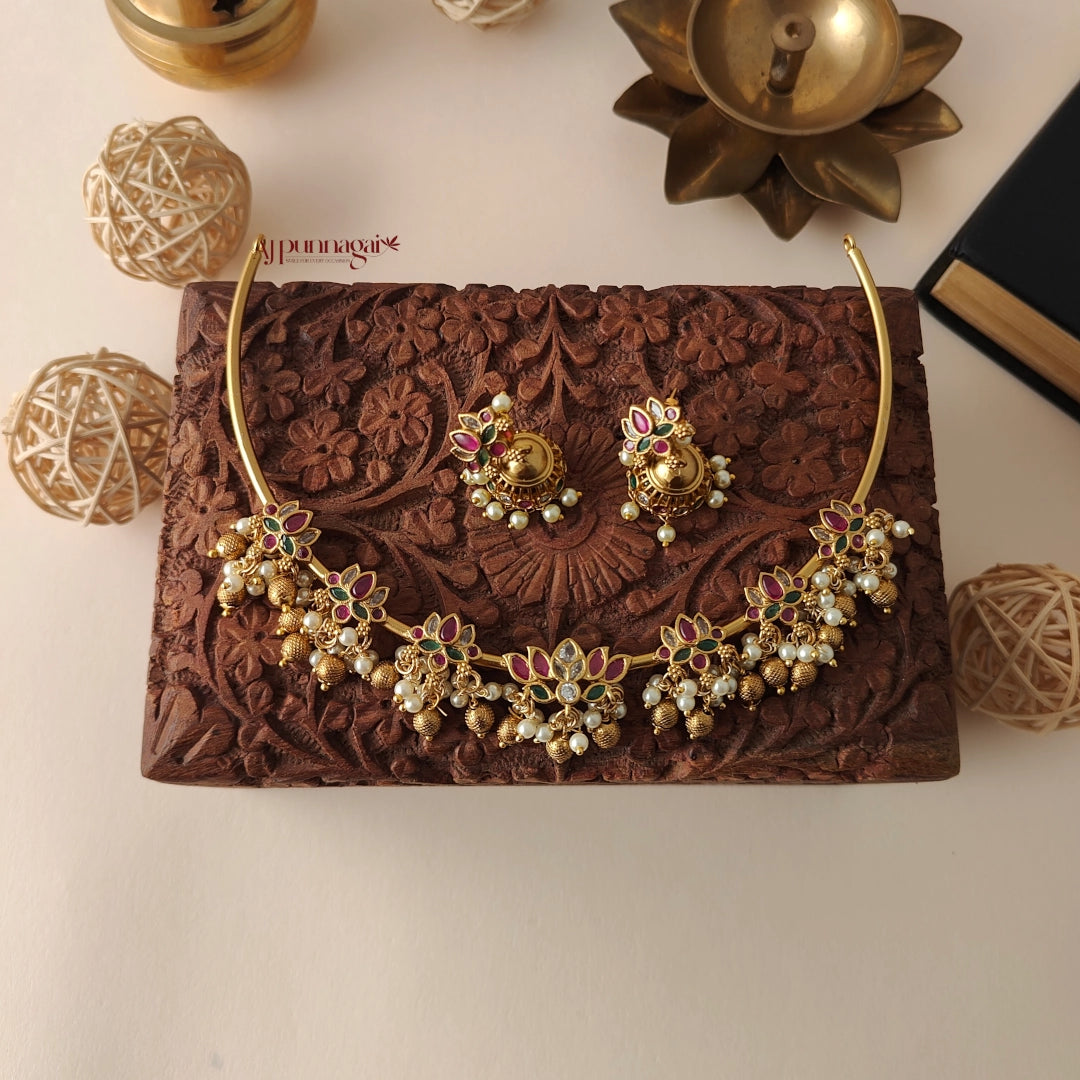 Traditional hasli necklace with intricate lotus flower motifs