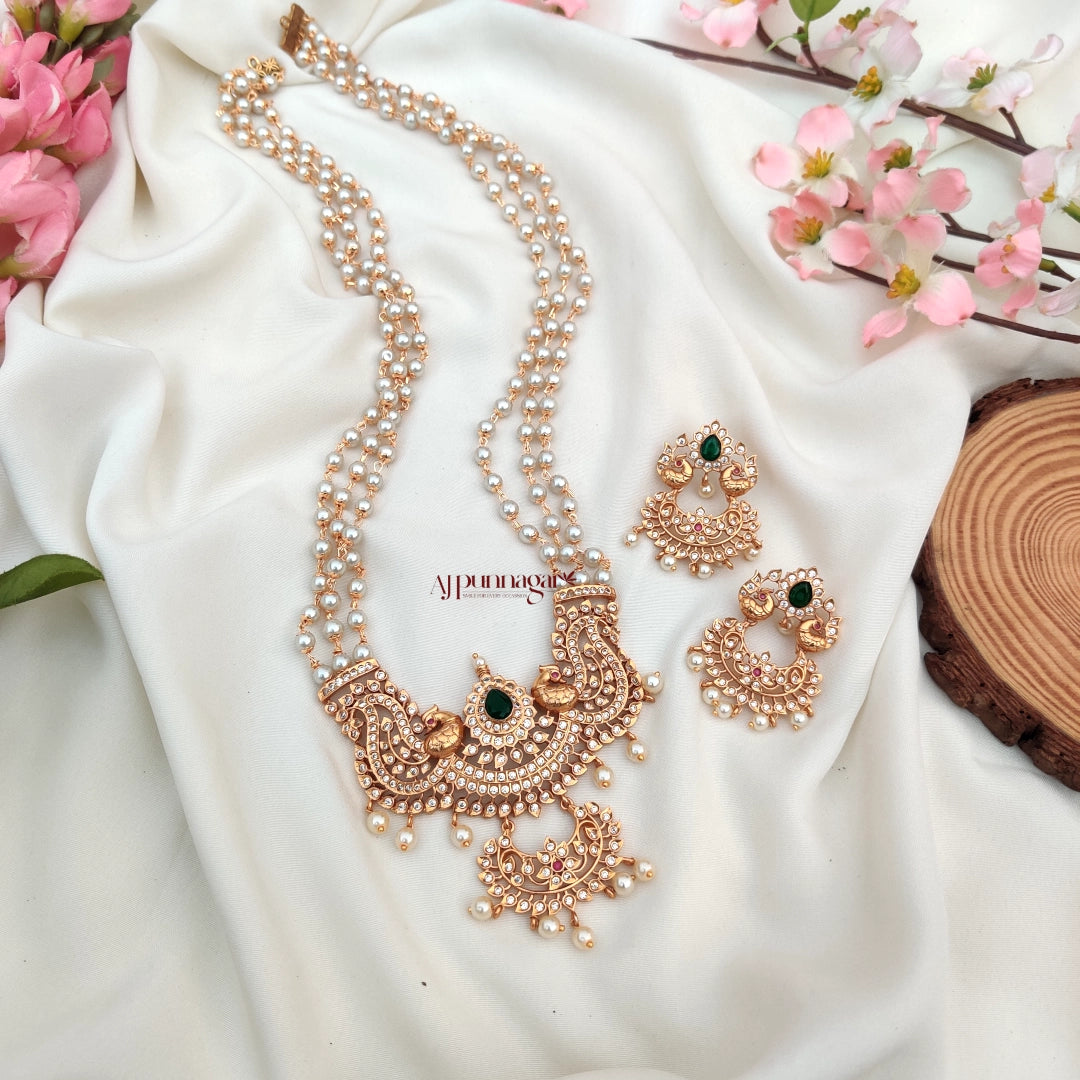 Gorgeously crafted Peacock Design Beaded Haram with white beads