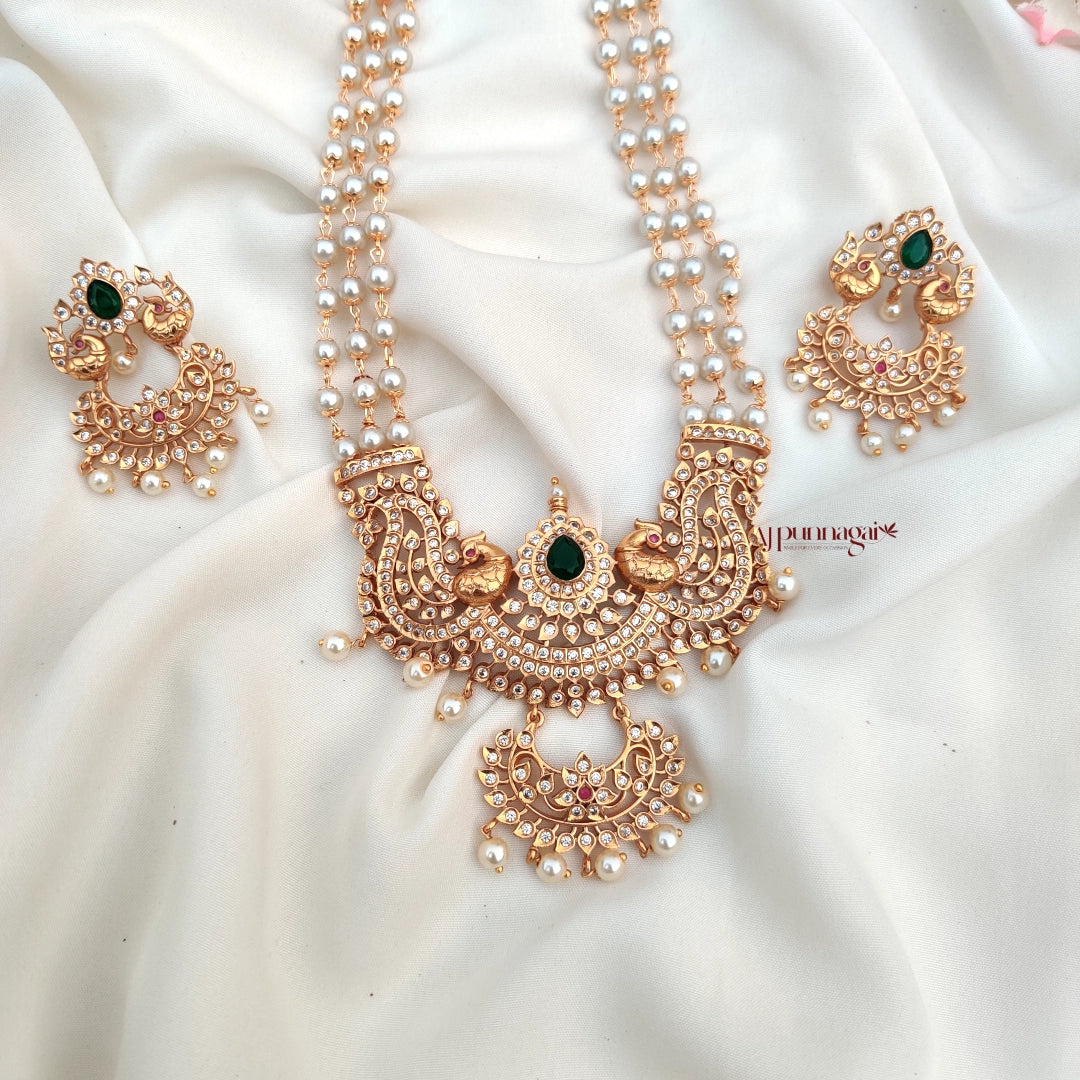 Gorgeously crafted Peacock Design Beaded Haram with white beads