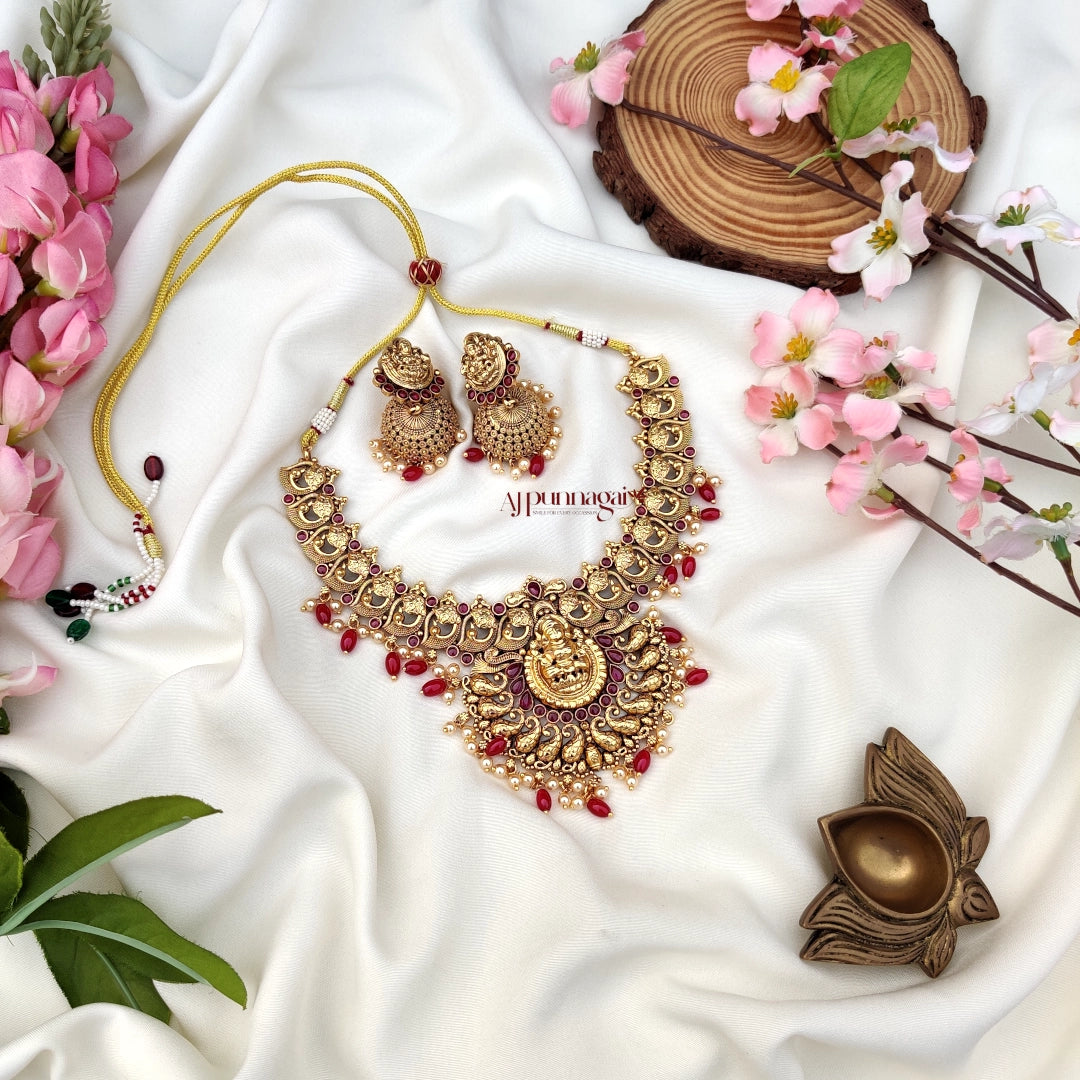 Stunning crafted Lakshmi Motifs Necklace with Pink beads