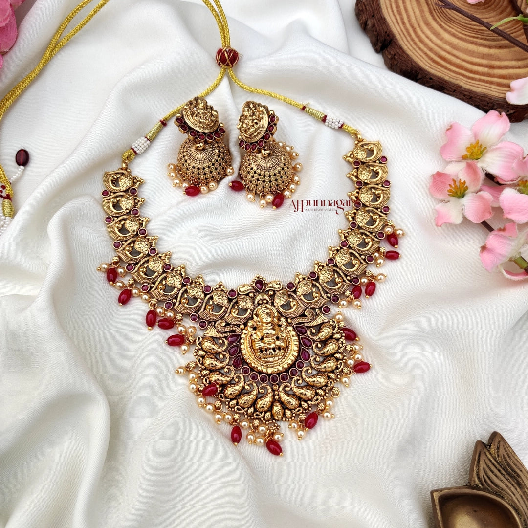 Stunning crafted Lakshmi Motifs Necklace with Pink beads