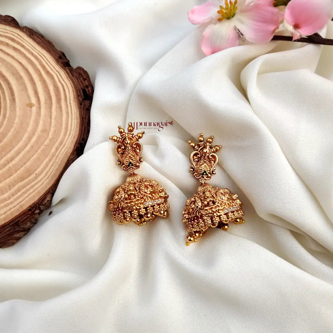 Traditional and minutely crafted AD stone Peacock Jhumka