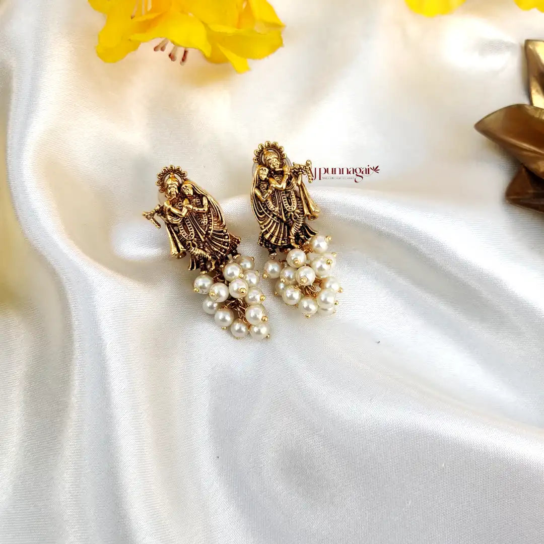 Eye-catching Radha Krishna Motifs Earring with Pearl Beads