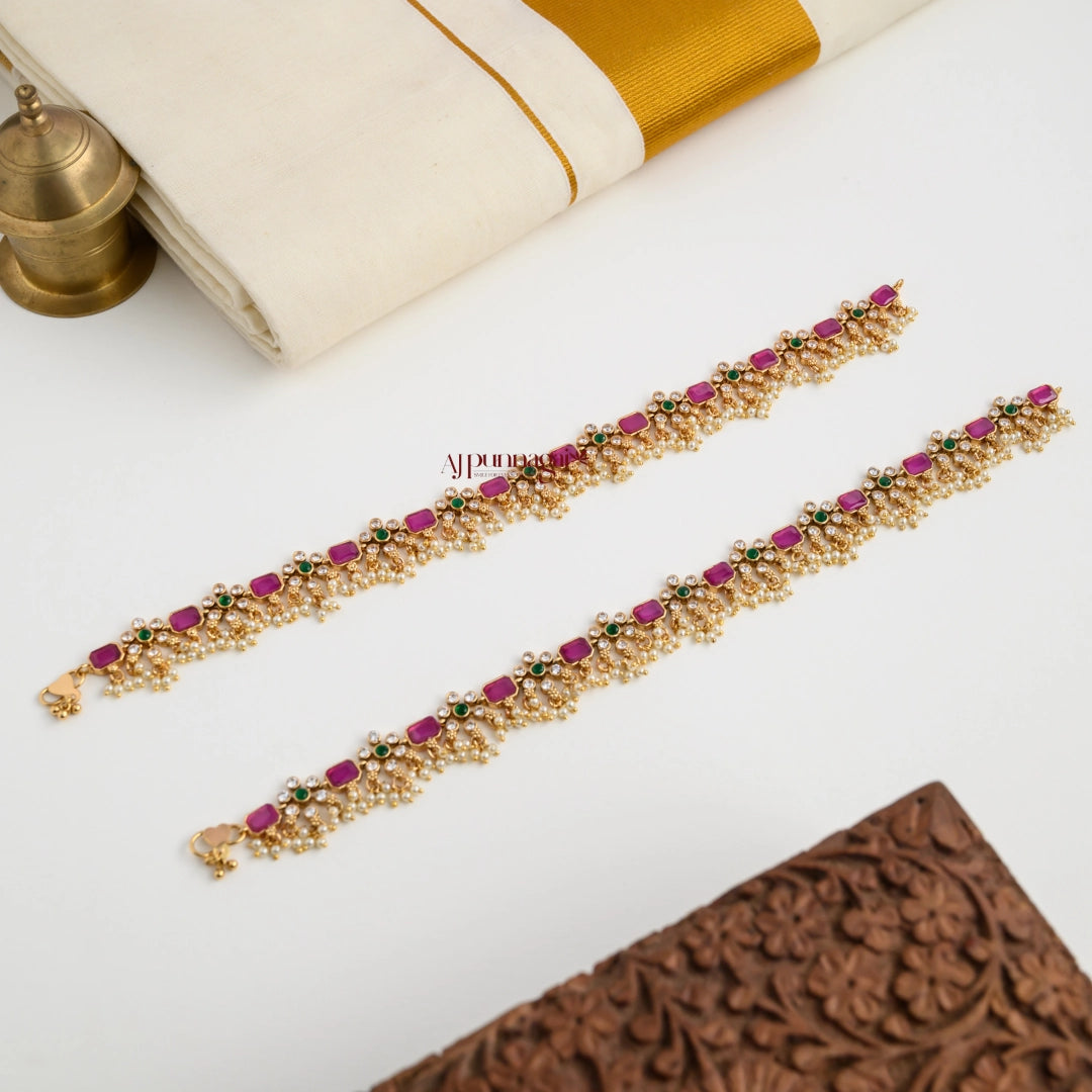 Gold look alike anklet detail view - matte finish brass payal with floral design for weddings