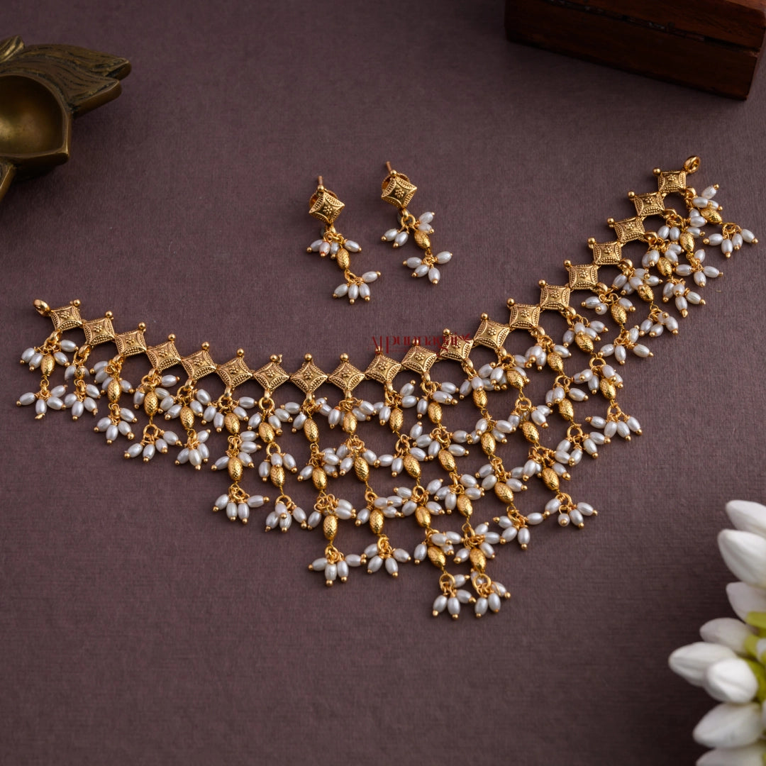 Trendy Diamond Shaped Rice Pearl Necklace