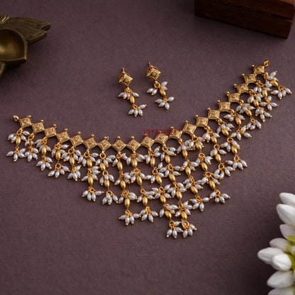 Trendy Diamond Shaped Rice Pearl Necklace