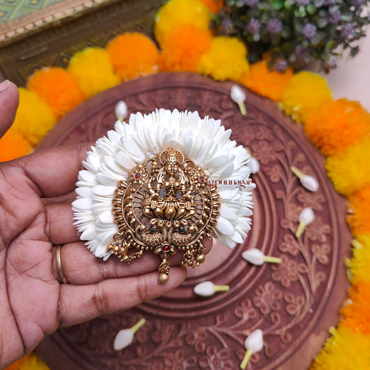 Royal Lakshmi With Foamiram Mullai Poo Hair Clip