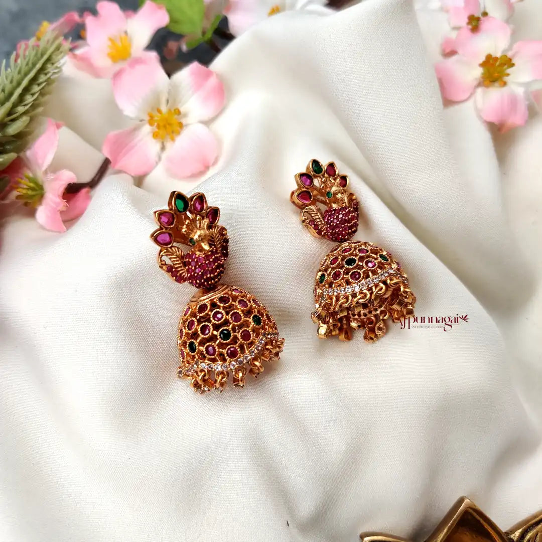Eyecatching Peacock design AD stone Jhumka