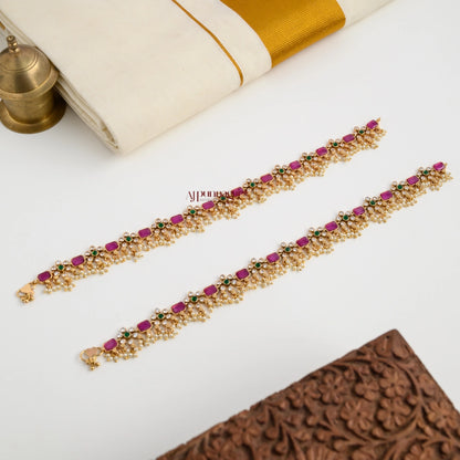 Gold look alike anklet detail view - matte finish brass payal with floral design for weddings